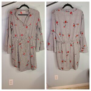 Rose dress with bell sleeves.